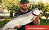Man with coho salmon female.