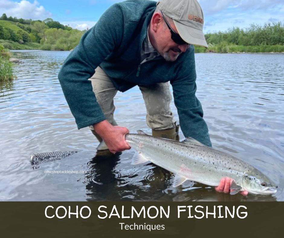 A man with a coho salmon in the water.